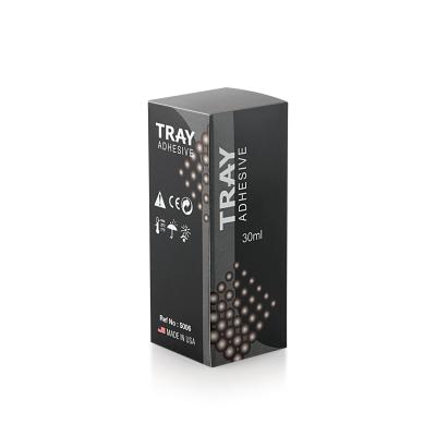 TRAY ADHESIVE